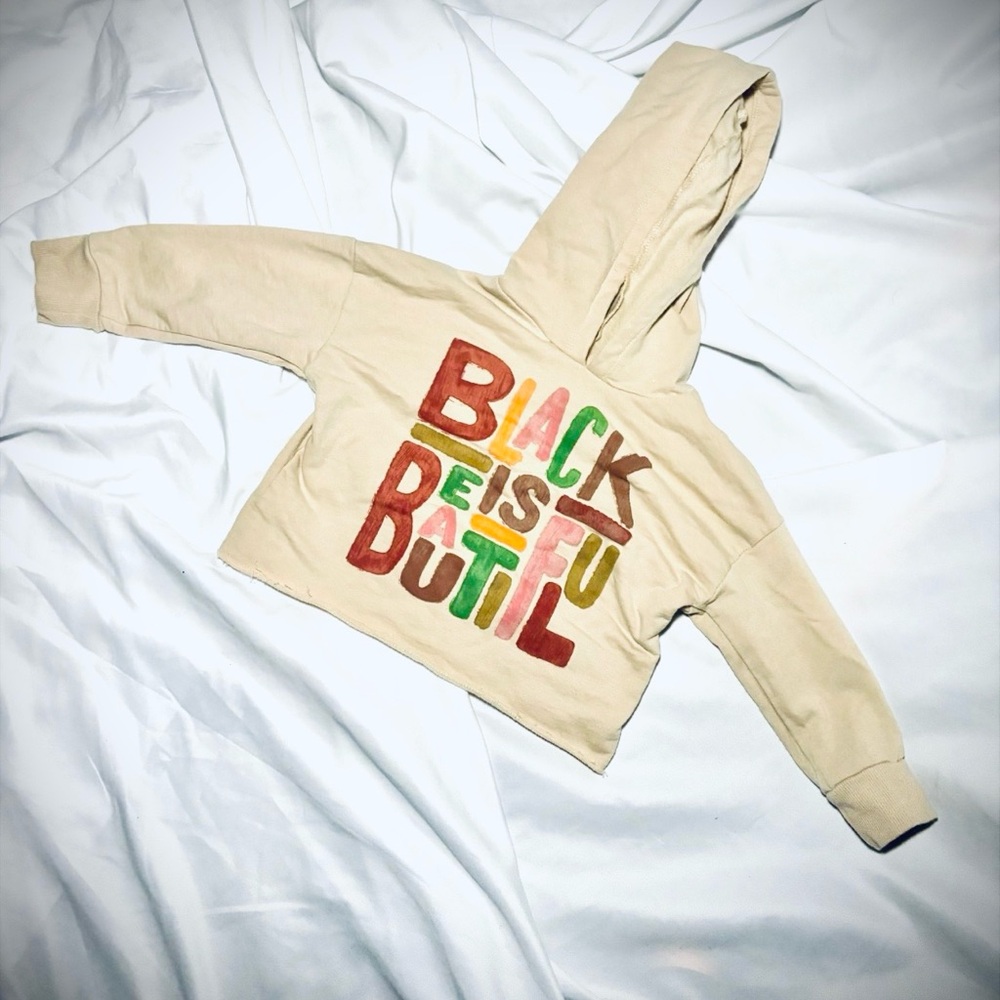 Beige Cropped Hoodie with Colorful 'Black Design Butiful' Print